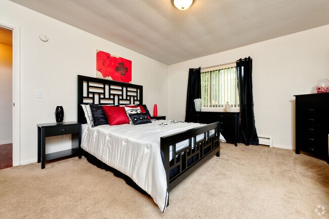 2BR, 1BA-900SF Primary Bedroom - Greece Commons