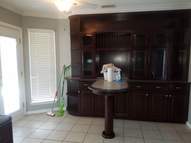 Kitchen with built in breakfast nook - 8808 Mystic Trail