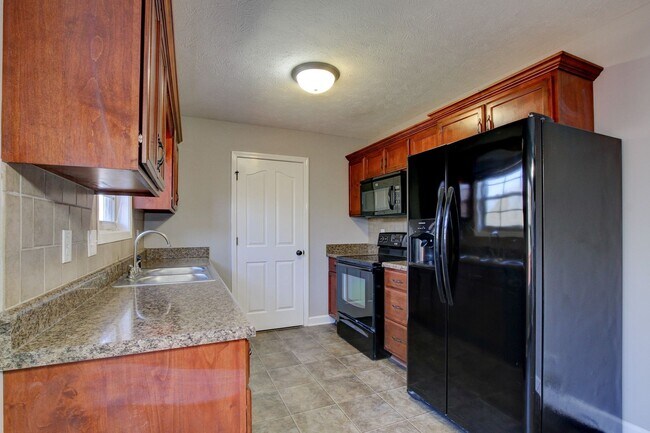 Foto del edificio - Amazing Brick Front Ranch Home With Hardwo...