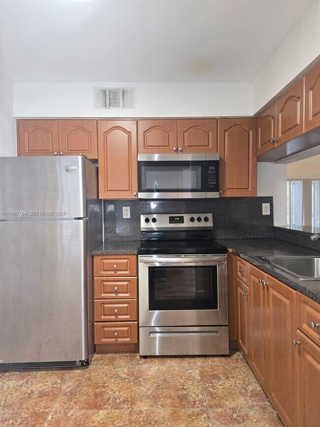 Building Photo - 9501 SW 138th Pl