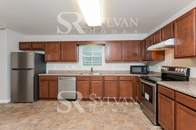 Building Photo - Fall in love with this spacious 3BR 2BA home