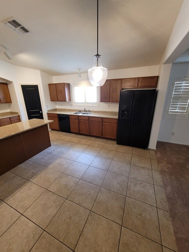 Building Photo - Beautiful 3/2 plus a den for rent near 75t...