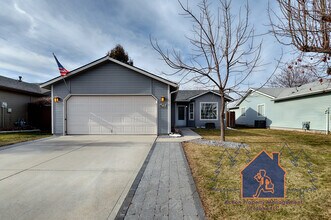 Building Photo - 1393 Caterpillar Ave N