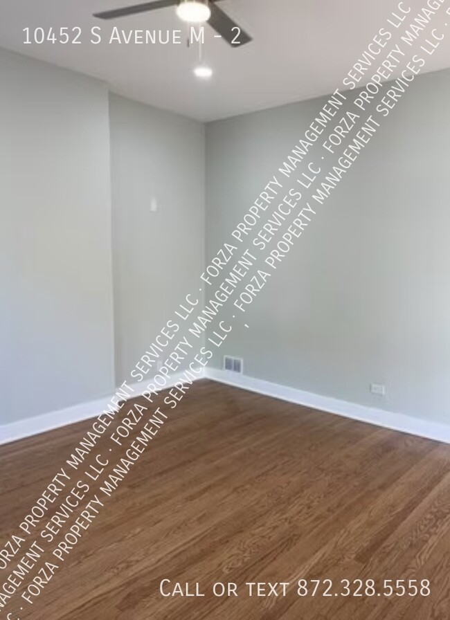 Building Photo - 10452 S Ave M
