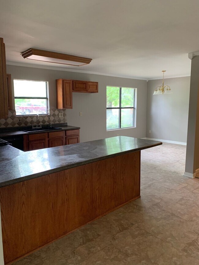 Building Photo - 4/2 Fenced Yard and Pet Friendly. SHISD