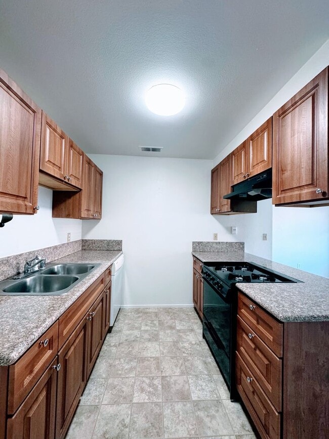 Photo - Charming 2-Bedroom Duplex with Large Fenced Yard & Attached Garage House