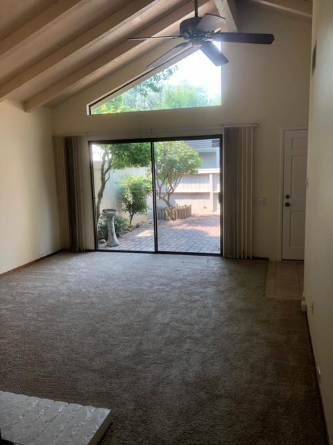living room w/view of front patio - 171 Hartnell Plz