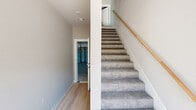 This well-appointed three-story home offers five bedrooms and five bathrooms across a thoughtfully designed layout. The ground floor houses a generously sized attached garage with dual bay doors, a horizontal clerestory window for natural light, and direct interior access via a hallway featuring light hardwood-style flooring and carpeted stairs with a warm wood handrail leading to the upper levels.

The main living floor is anchored by an open-concept kitchen and living area. The kitchen is outfitted with crisp white shaker cabinetry, stainless steel appliances, a large center island with an integrated sink and quartz countertop, and multiple windows that flood the space with natural light. The adjoining living area continues the light hardwood flooring and neutral palette, with large windows offering outdoor views.

The upper floor accommodates the five bedrooms, each finished with light hardwood-style floors, neutral toned walls, and natural light from well-placed windows. The generously sized primary bedroom features a ceiling fan and ample room. The bathrooms are clean and modern, with tiled tub-shower combinations and windows for ventilation. A dedicated laundry room with side-by-side washer and dryer adds everyday convenience. Throughout the home, the consistent use of light tones, hardwood-style flooring, and abundant natural light creates a bright, cohesive, and welcoming atmosphere.