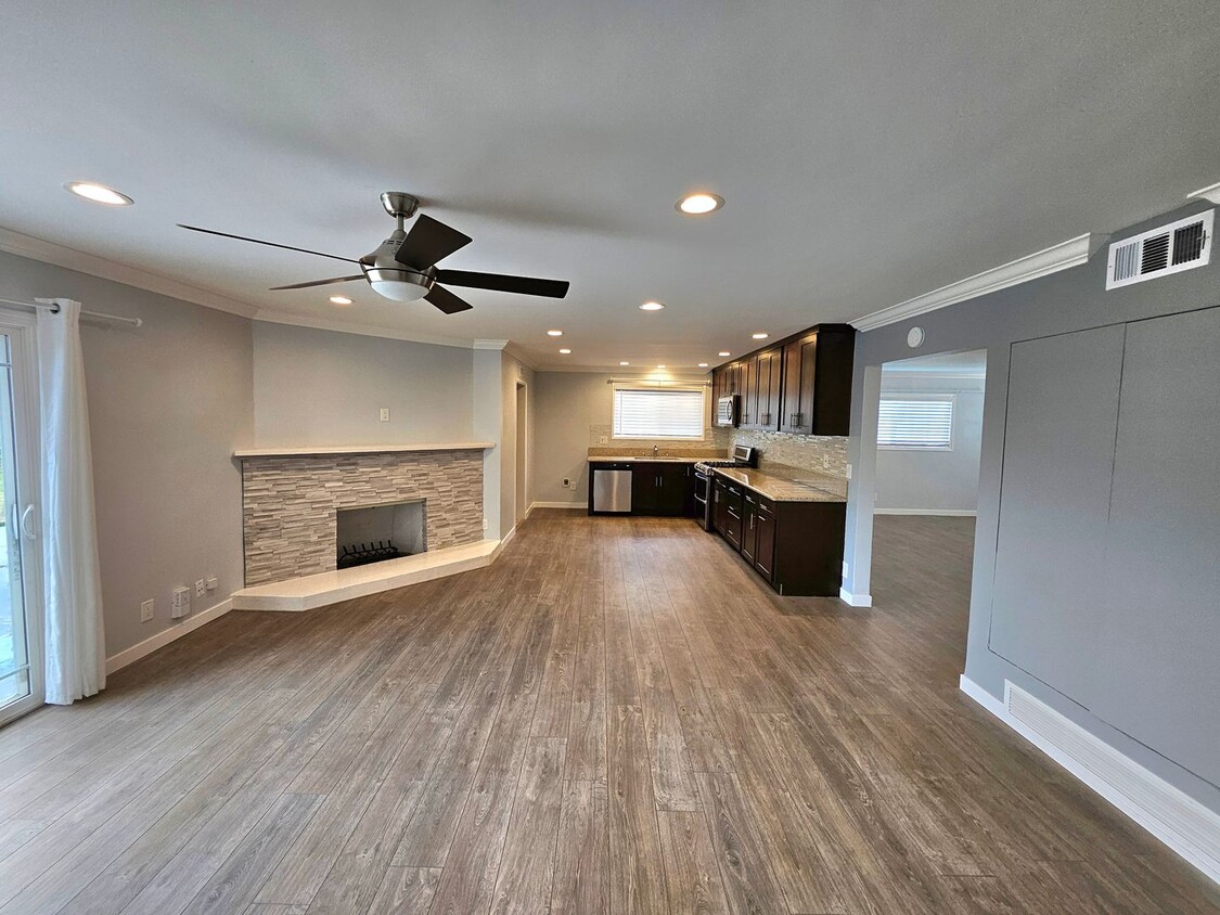 Primary Photo - Spacious 3-Bedroom Home with Charming Feat...