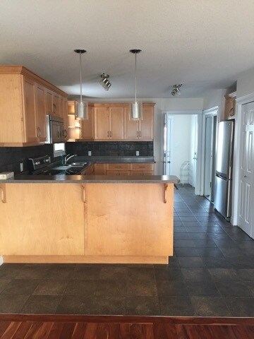 Photo du bâtiment - 3 Bed 2 Bath Unit in Fort Mcmurray, AB