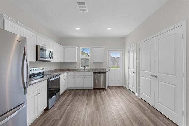 Foto del edificio - 10006 Tiger Flower Ln