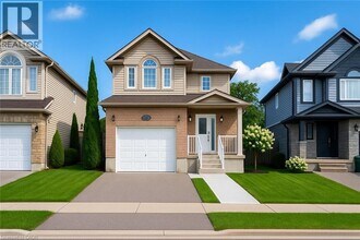 Building Photo - 240 Purple Sage Crescent