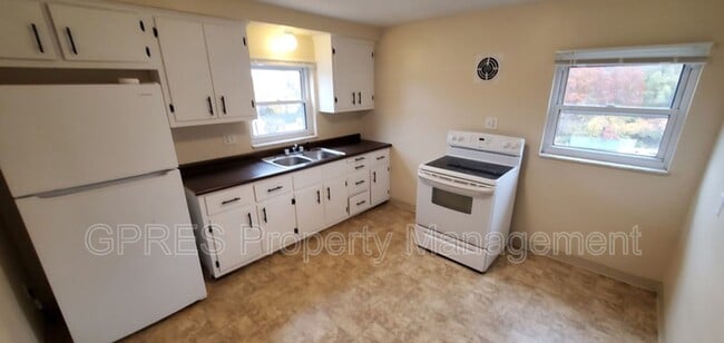 Building Photo - 5706-5708 Poketa Rd.
