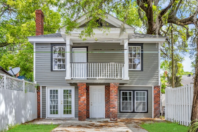 Off-street parking for up to 4 cars, fenced in from street for added security. - 844 E 37th St