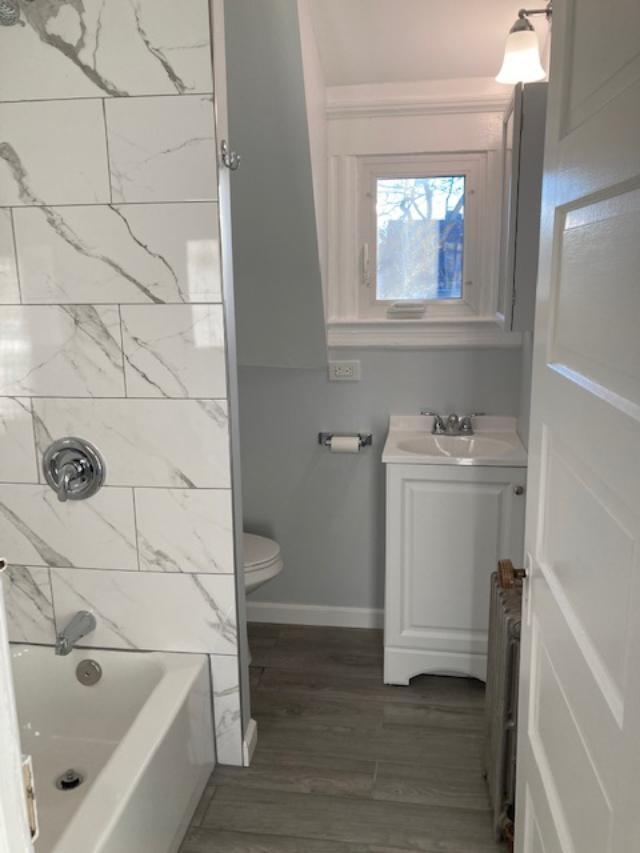 newly renovated bathroom with new granite tiles - 268 Valley St