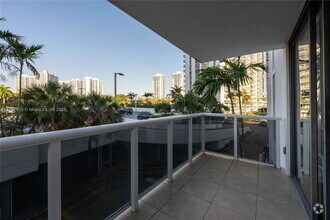 Building Photo - 3675 N Country Club Dr