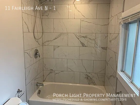 Photo du bâtiment - Main Floor 2 Bedroom with Parking, Yard and great deck