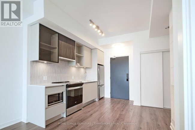 Photo du bâtiment - 395-395 Dundas St W