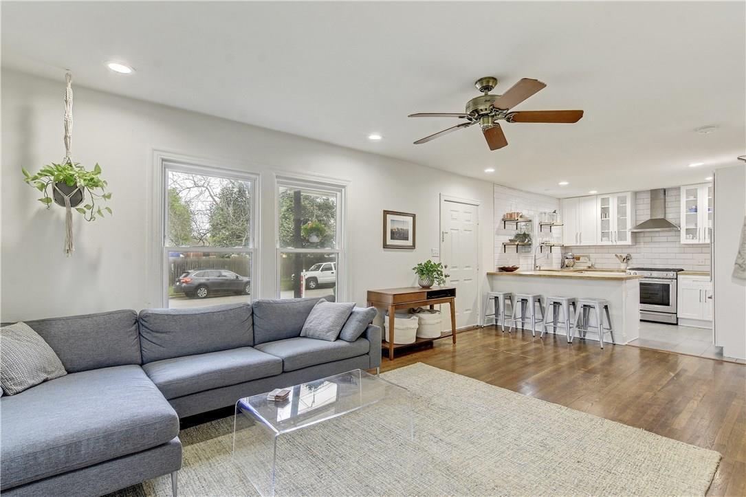 Open Concept Kitchen to Living Room with Hardwood Flooring, Ceiling Fan - 5715 Joe Sayers Ave