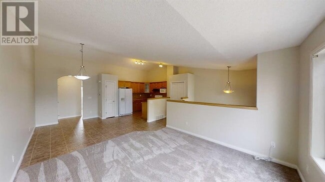 Building Photo - 9129-9131 131 Ave