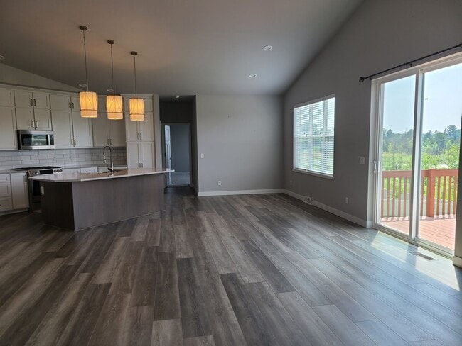Building Photo - Four Bedroom Three Bath Single Family Home
