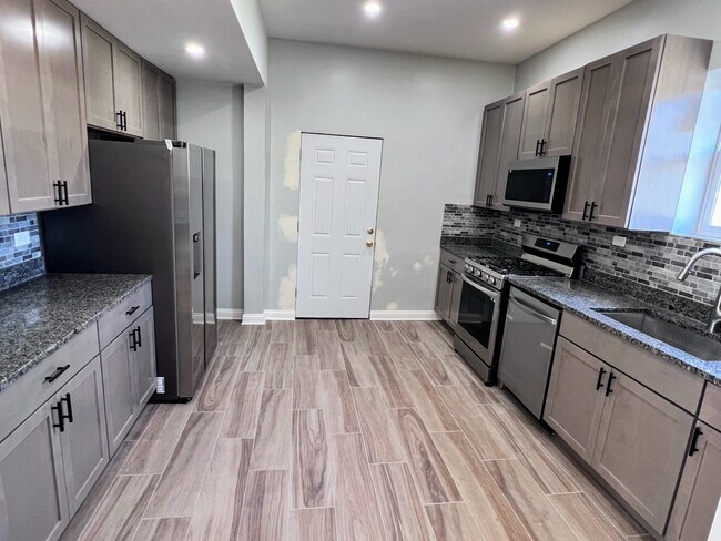 Foto del edificio - 4244 N Spaulding Ave