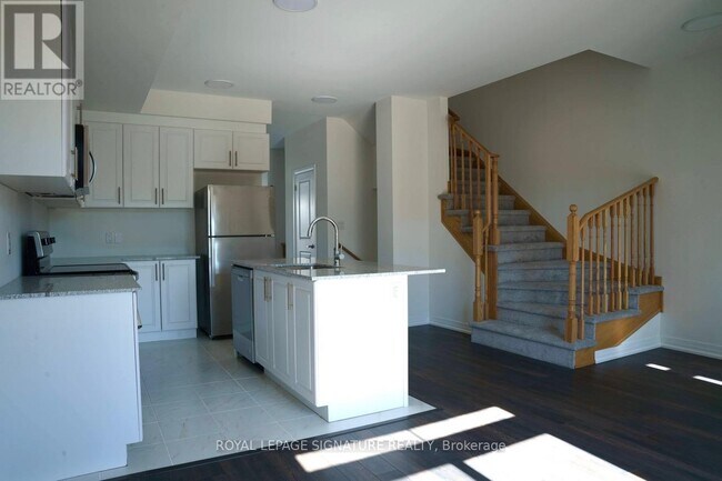 Photo du bâtiment - 75 Sidney Rose Cmn