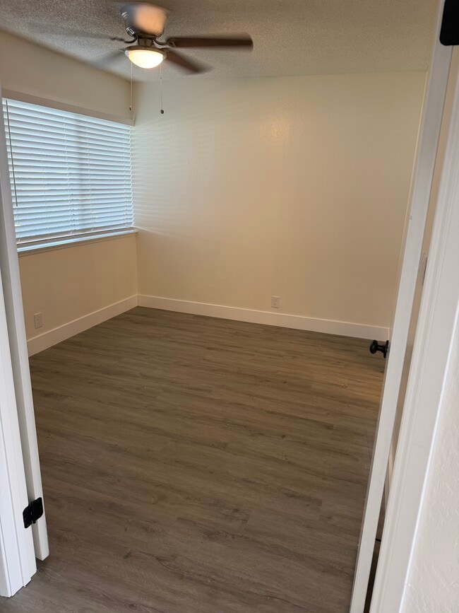 Downstairs bedroom with French doors and attach bathroom - 5128 Greenberry Dr