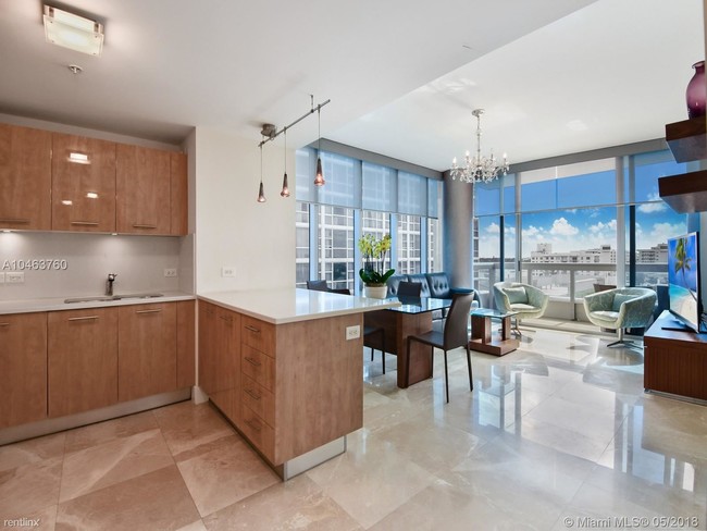 Building Photo - 6899 Collins Ave