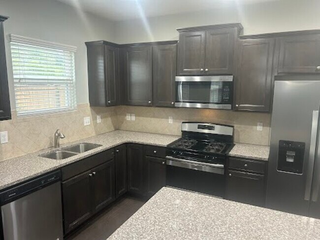 Building Photo - 8004 Remington Heights Drive