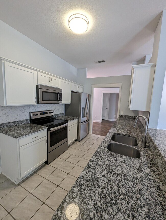 Foto del edificio - 9044 Quail Roost Dr