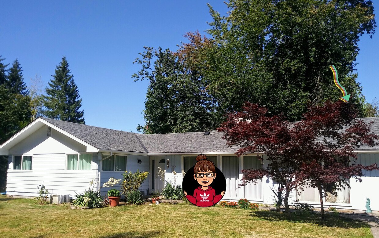 Street view of the house, rental entrance is around back - 521 SE Cook Plant Farm Rd