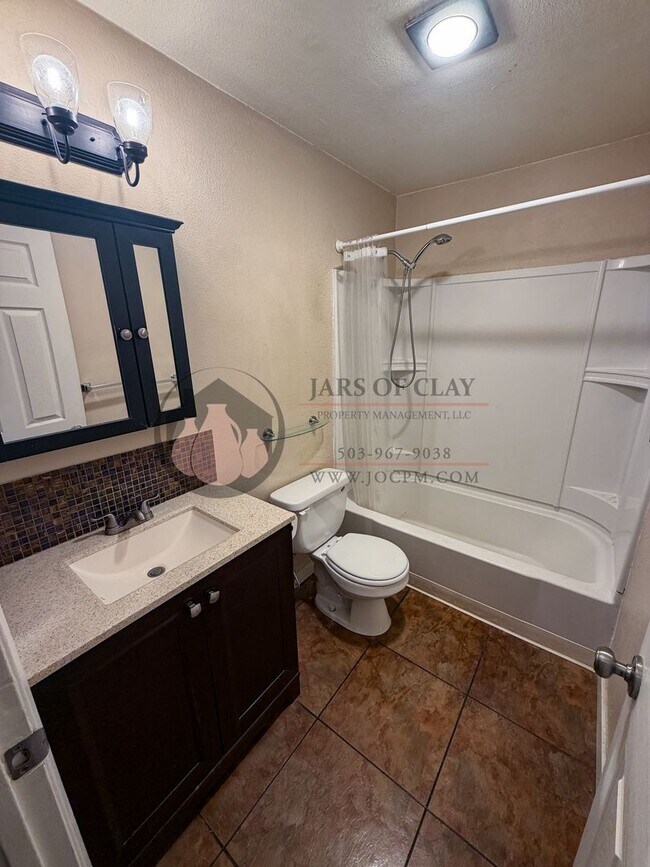 Building Photo - Beaverton Community Living | Dedicated Off-Street Parking & Great Layout