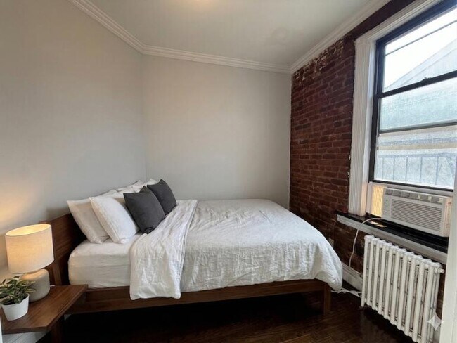 Foto del edificio - 410 E 13th St