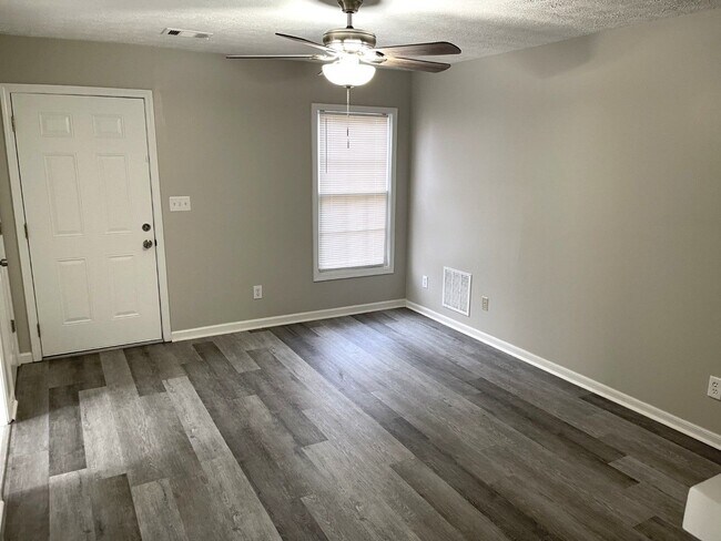 Building Photo - Corner unit, parking for 2 cars, LVP floor...