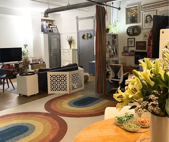 Open living space, looking from kitchen into living room. - 108 W 2nd St