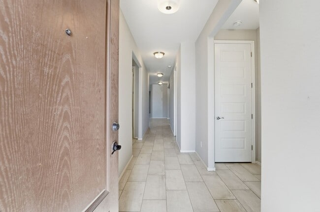 Building Photo - Modern Surprise Home with 3-Car Garage and Designer Upgrades