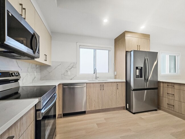 Building Photo - 6123-6133 33 Ave NW