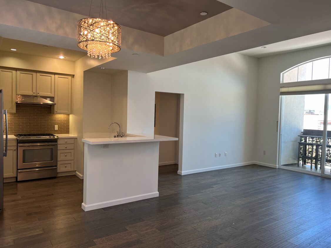 Kitchen, dining, living room and balcony - 1625 Granville Ave