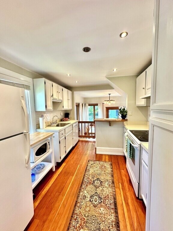 Kitchen facing rear of home - 59 Monroe St