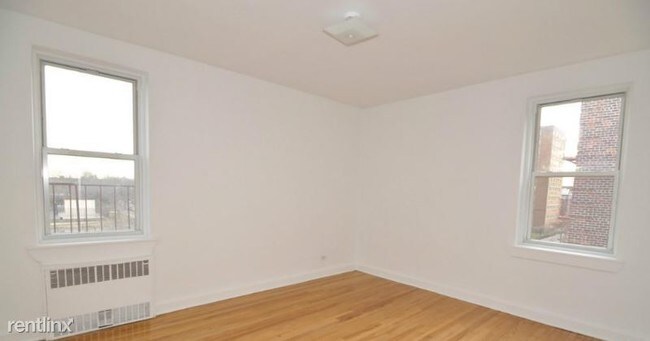 Building Photo - 39-50-50 52nd St