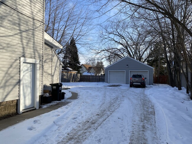 Garage stall on left included, private entrance and separated by wall from other stall - 609 McDonough St