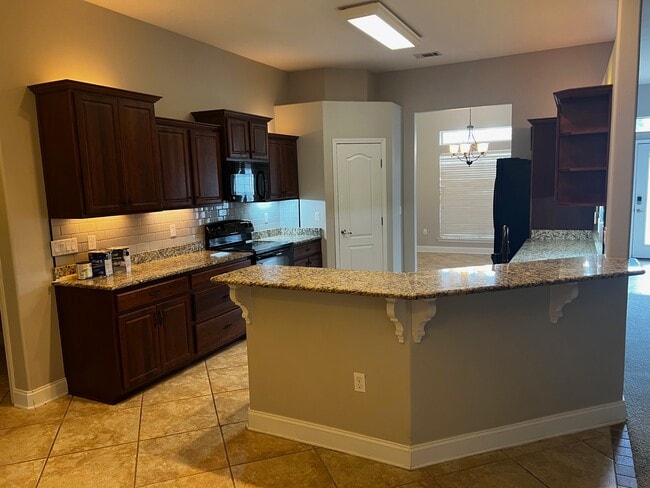 Foto del edificio - 9722 Misty Meadow Ln