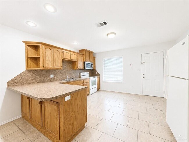 Foto del edificio - 1523 Oasis Dr