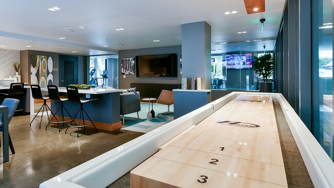 Up for a game of shuffle board? - Modera San Pedro Square