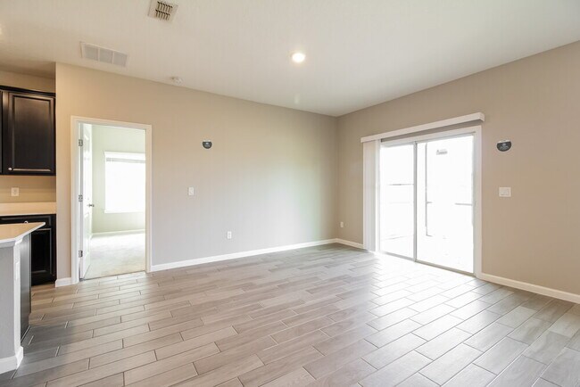 Building Photo - 9865 Lemon Grass Ln