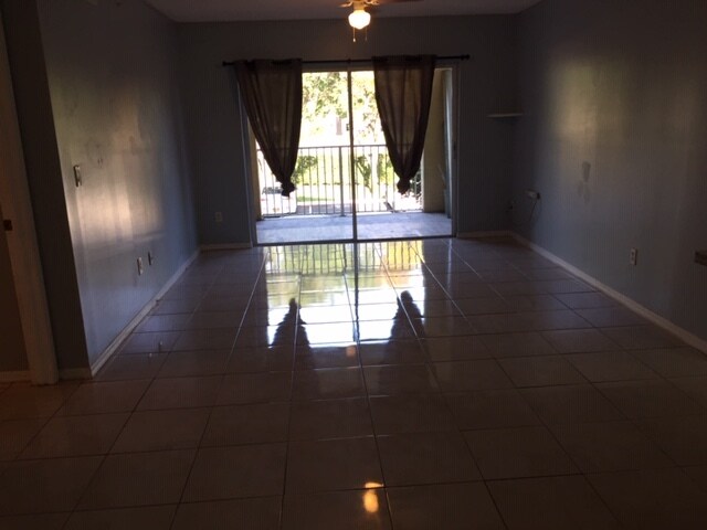 Living Room with Balcony - 2640 S University Dr