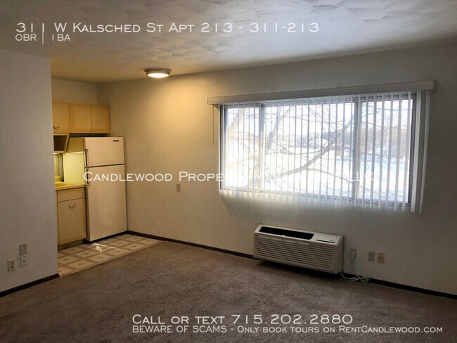 Building Photo - Studio Upper Apartment Available Now!