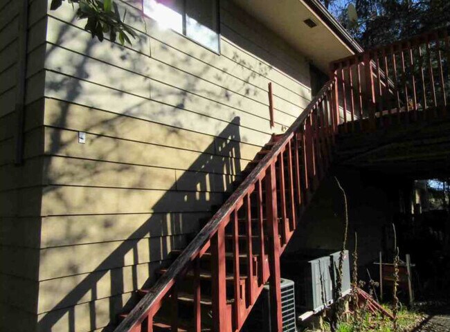Rear of apartment with large deck - 25859 Madrone Dr