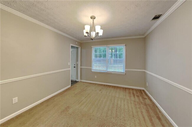 Foto del edificio - 5051 Sugar Creek Dr